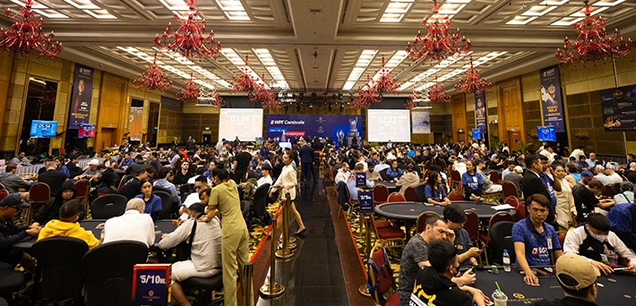 WPT Cambodia Tournament Action at NagaWorld Poker Room Players competing at poker tables during WPT Cambodia festival at NagaWorld casino