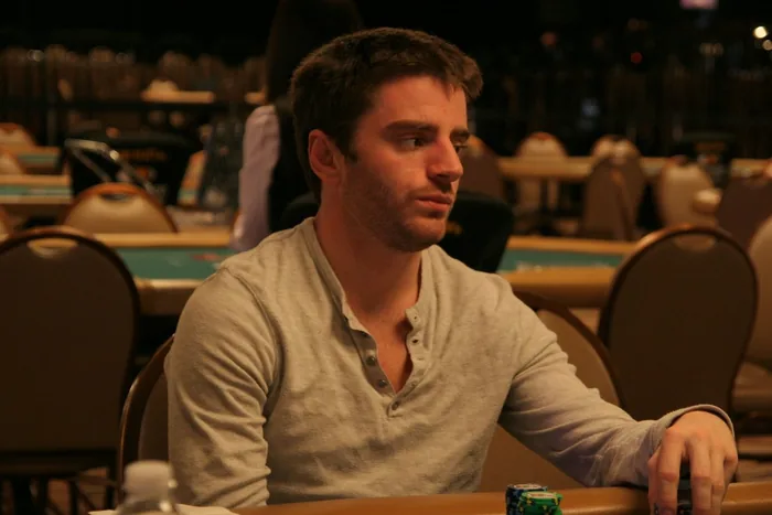 Ashton Griffin at a live tournament table, a collegiate wrestler and former cross-country runner
