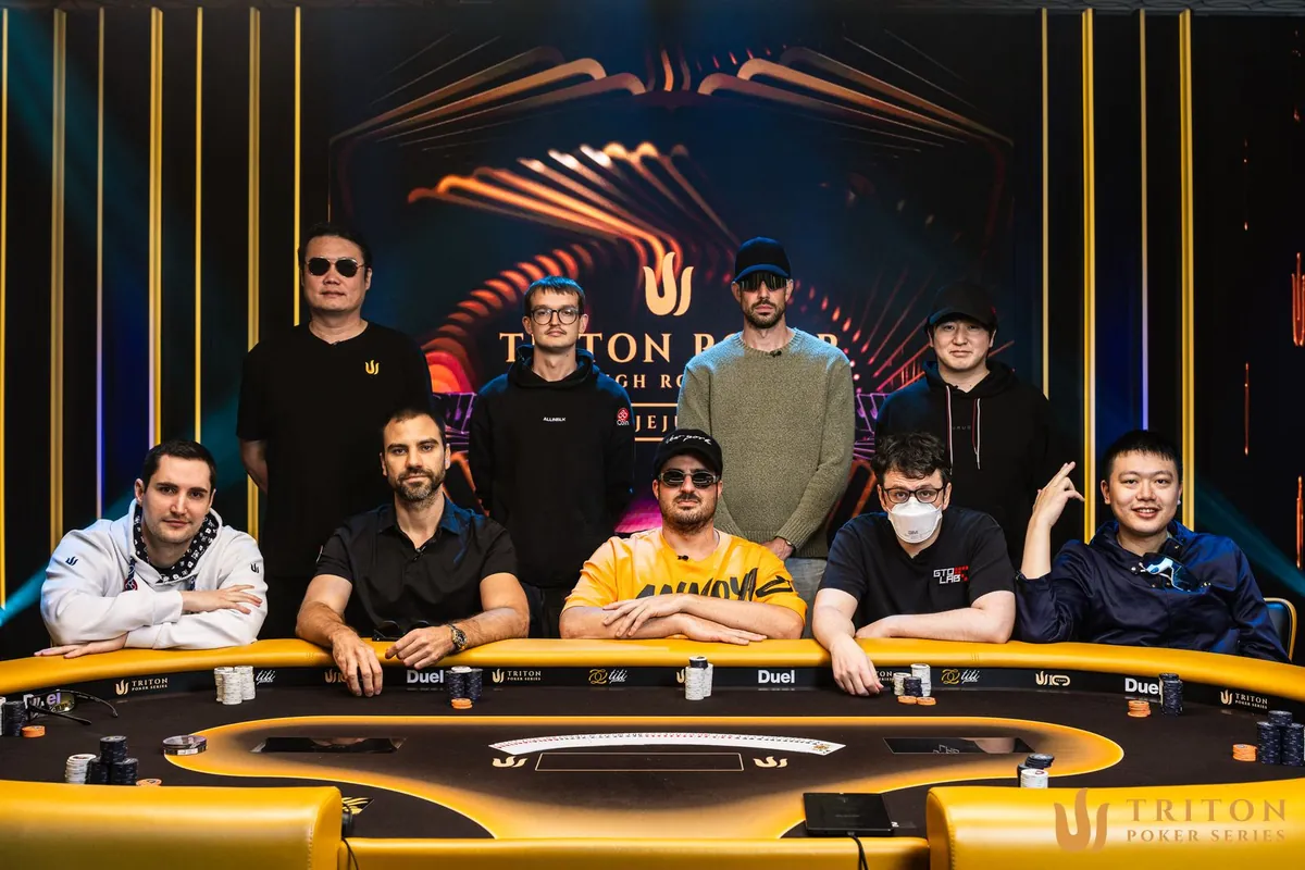 The nine-handed final table of the $100,000 Triton Jeju II Main Event before play began
